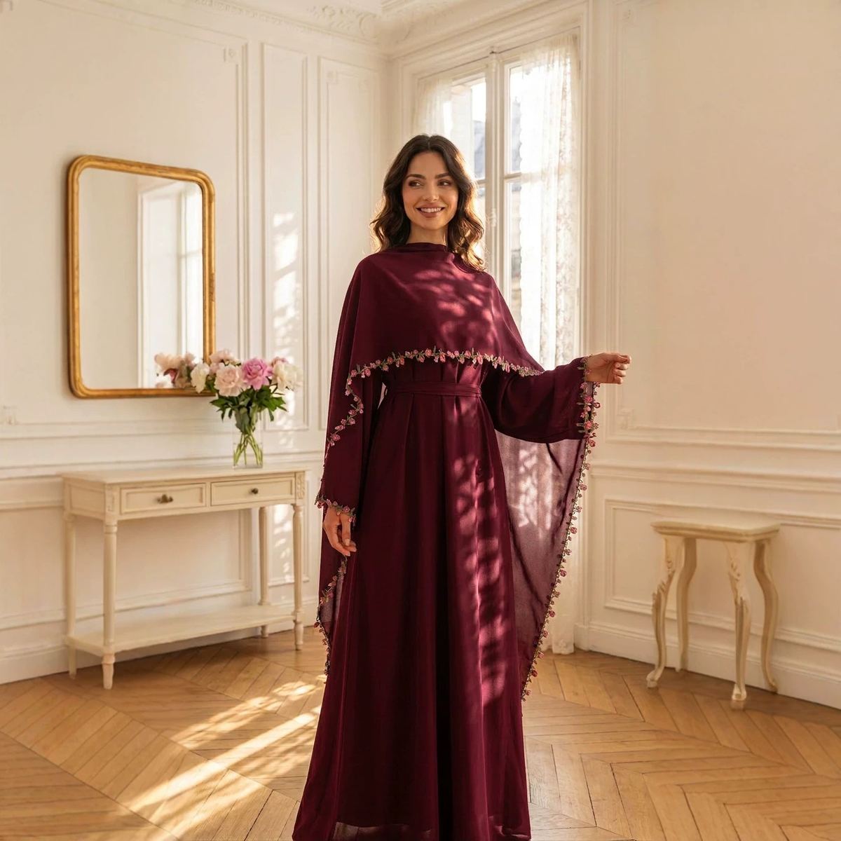 Model in a pink lace-trimmed two-piece modest dress with matching hijab
