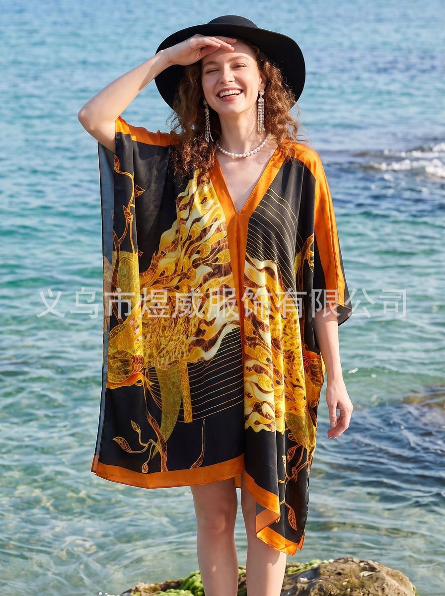 Plus-size V-neck kaftan maxi dress in black with gold feather print and orange edge photo 2